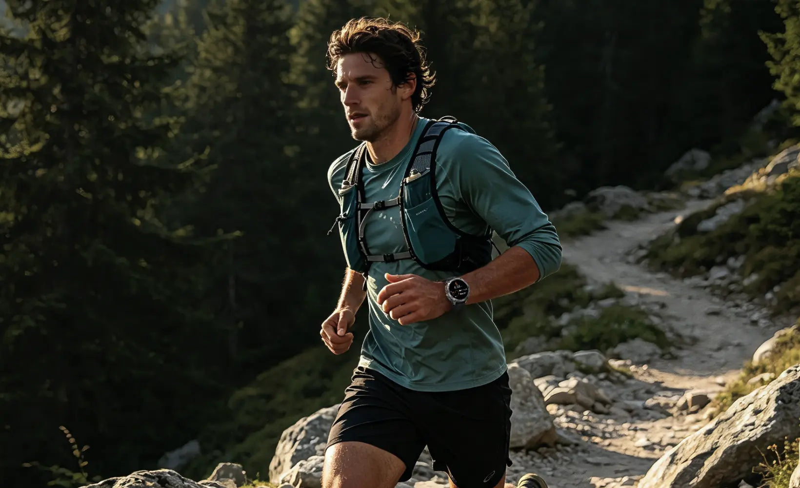 Trail runner wearing a KOSPET running smartwatch on a rocky mountain path | KOSPET Smartwatch